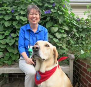 volunteer with dog