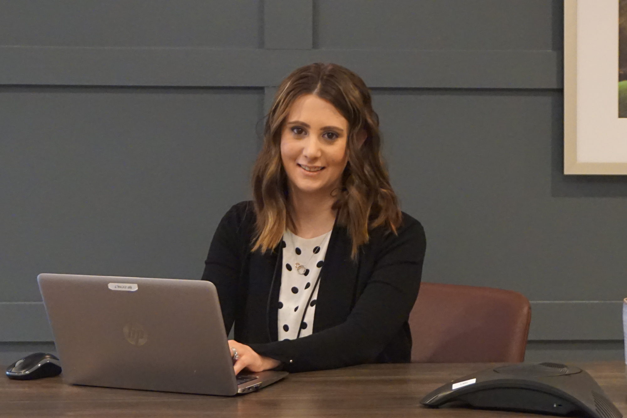 Laura Smith at desk