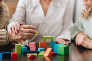 dementia resident with blocks