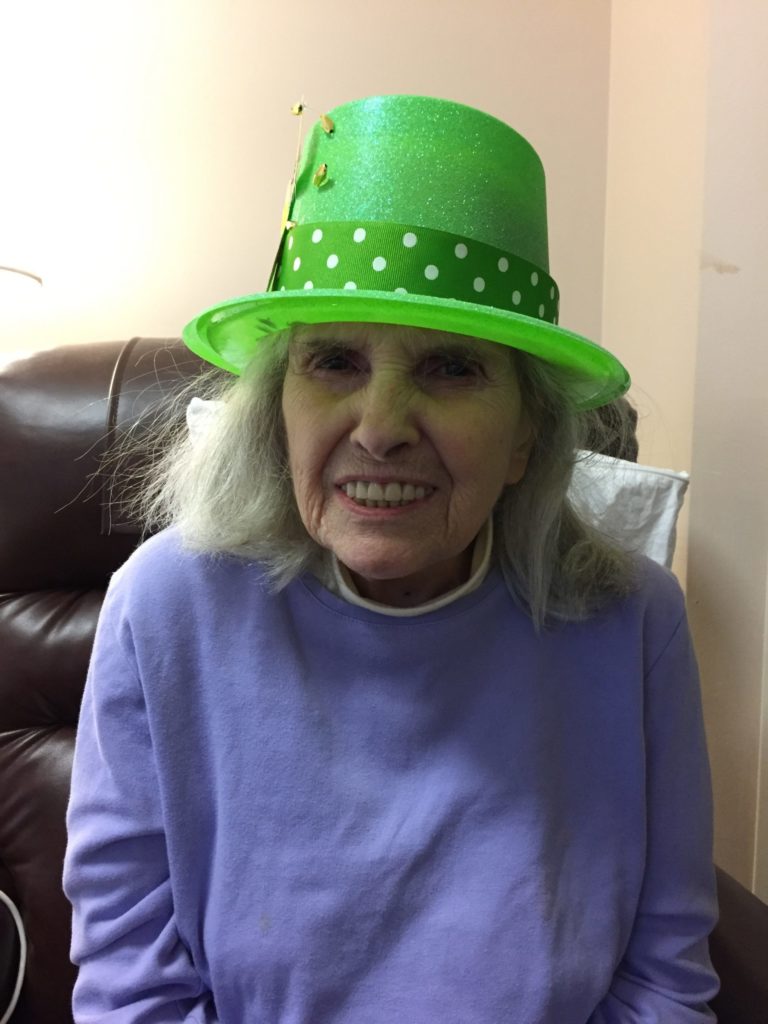 Resident wearing hat