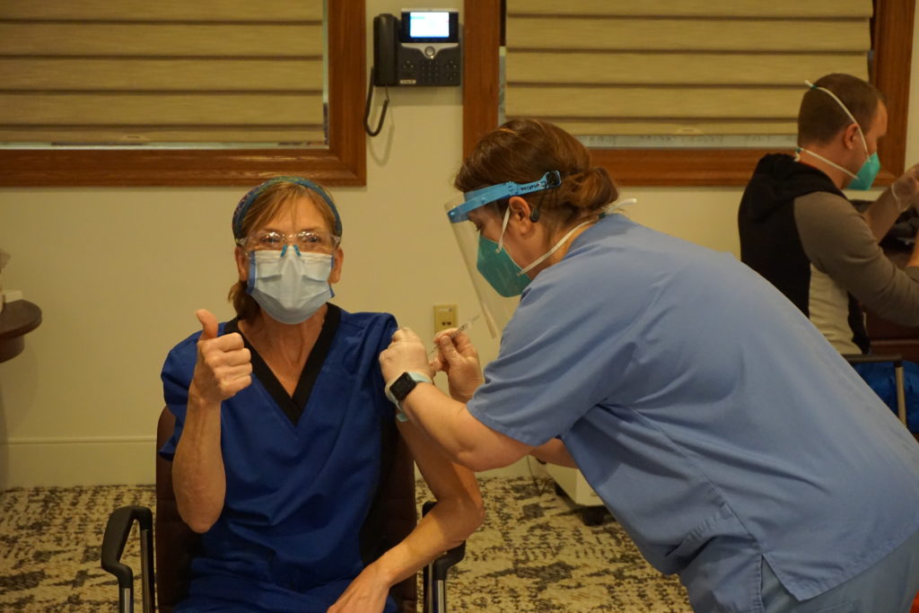 Barclay Friends nurse receiving shot