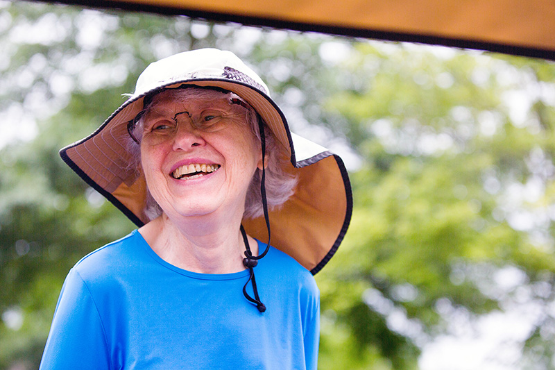 Senior wear hat for sun protection